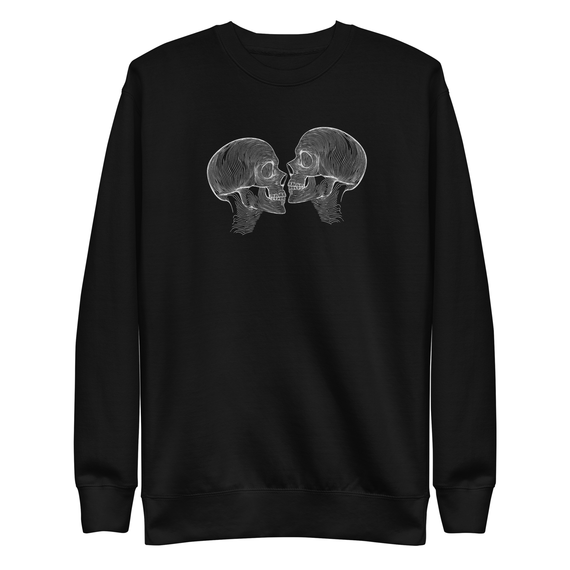 "Counterparts" design featuring two mirrored skulls with intricate white linework, symbolizing duality and connection, placed on a black sweater for a minimalist look.